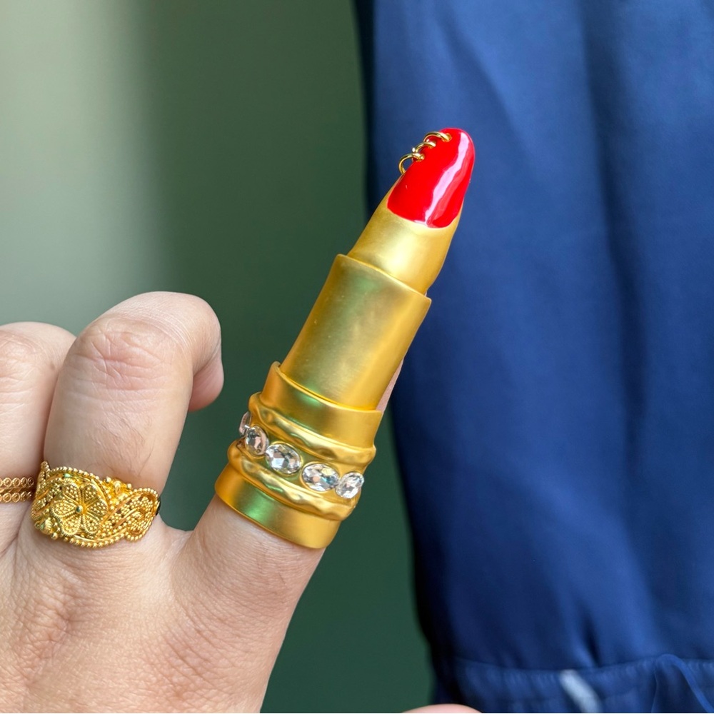 Schiaparelli inspired Gold and Red finger design Ring